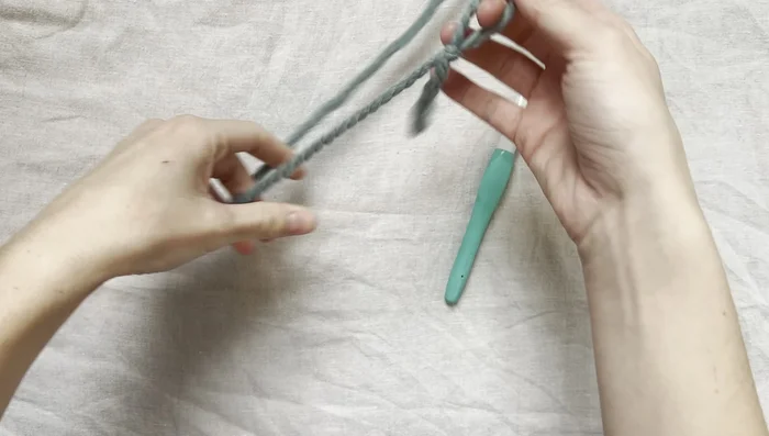 Slip stitch to join the chain, forming a loop.