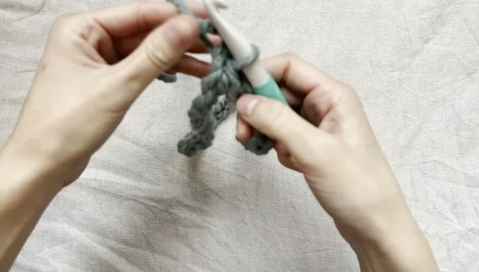 Slip stitch to join the chain, forming a loop.