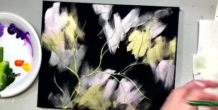 Add more violet pansy to deepen the rosebud color, using a layering technique and the tip of the brush.