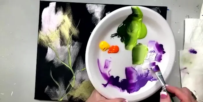 Add more violet pansy to deepen the rosebud color, using a layering technique and the tip of the brush.