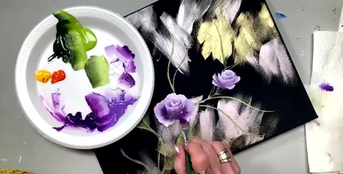 Add more violet pansy to deepen the rosebud color, using a layering technique and the tip of the brush.