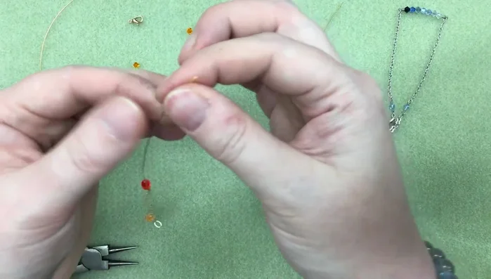 Thread seven 4mm Swarovski crystals onto the wire.