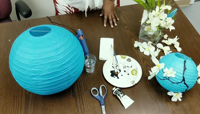 Address potential holes: If you accidentally punch a hole in the lantern, don't worry; you can cover it later.