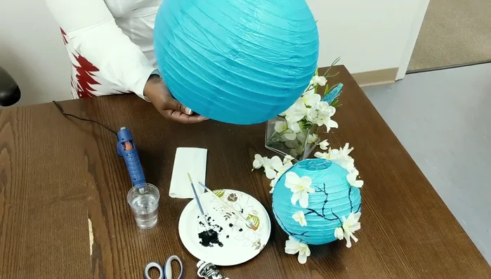 Address potential holes: If you accidentally punch a hole in the lantern, don't worry; you can cover it later.