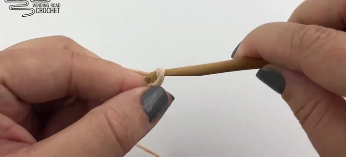 Make a slip knot and insert your hook. Chain 142 (child) or 182 (adult).