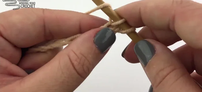 Turn your work and single crochet in the second chain from the hook. Work two single crochet into the first chain and single crochet in each stitch across, increasing by two single crochet in the last chain.