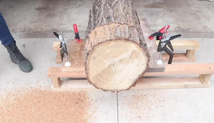 Remove bark with chainsaw
