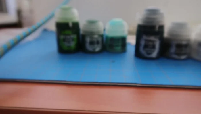 Apply a base coat of black acrylic paint.