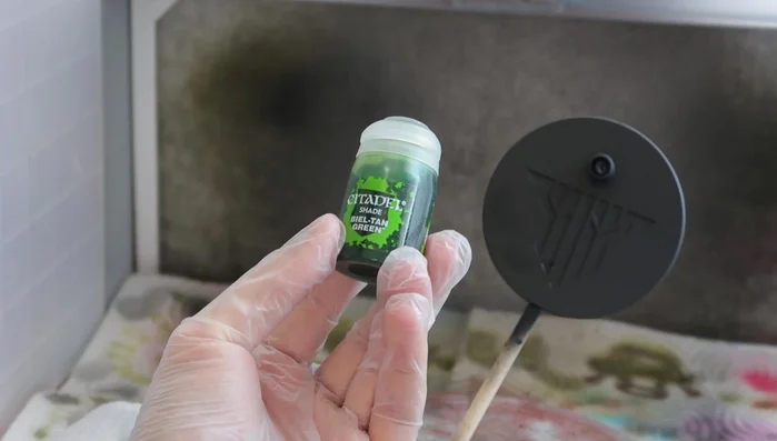 Apply a base coat of black acrylic paint.