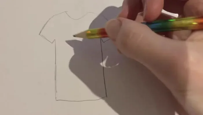 Lightly sketch your design onto the fabric using a pencil (or chalk pastel for delicate fabrics). Don't worry about perfection, just enough to guide your painting.