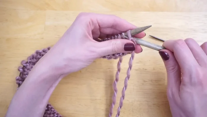 Repeat Rows 2-9 until the piece reaches 34 inches in length. Ensure you finish one row before a cable row (Row 4 or Row 8).