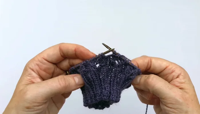 Round four: Purl the purls and knit the knits.