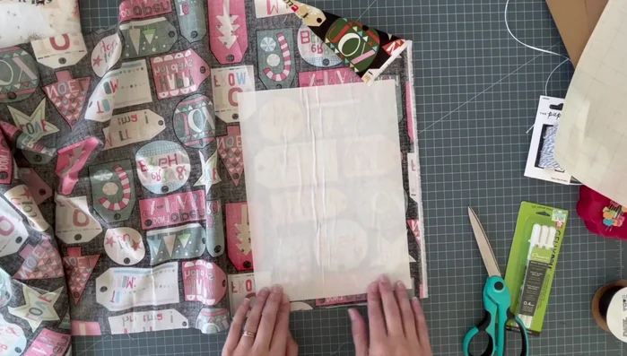 Cut out fabric shapes: Cut out your desired shapes from the fabric. You can freehand it or use templates.