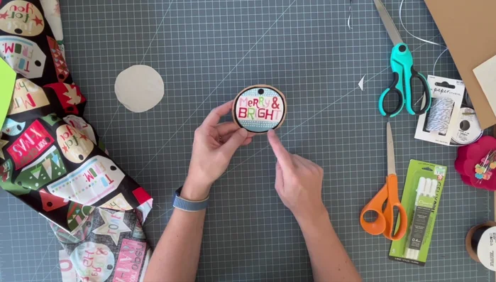 Optional: Sew around the edges: Enhance the gift tag's appearance by sewing around the edges with decorative thread.