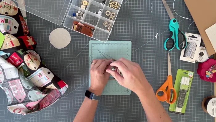 Optional: Add eyelets: For a more professional look, add eyelets to reinforce the hole.