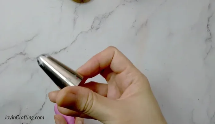 Cut away any excess clay.