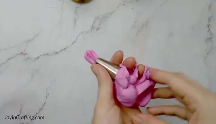 Cut away any excess clay.