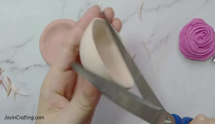 Cut away any excess clay.