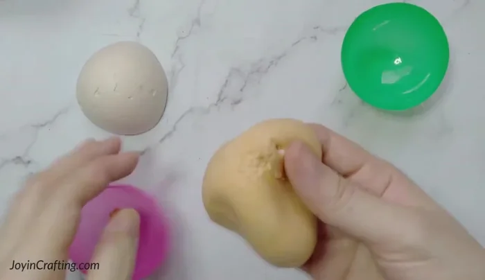 Gently remove the clay from the mold.