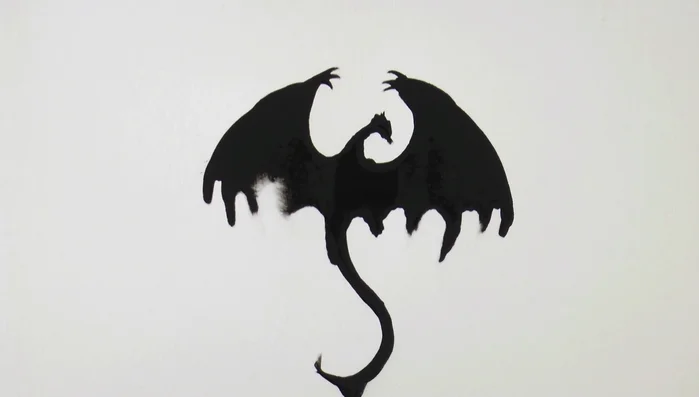 Add ink drops and tilt the paper to create desired shapes.