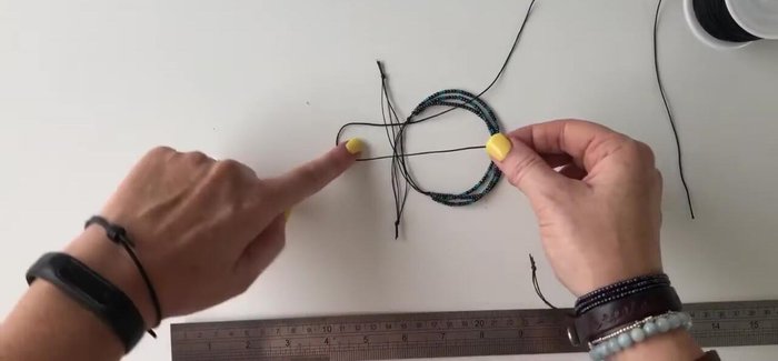 Trim the excess sliding knot threads and seal with a lighter.