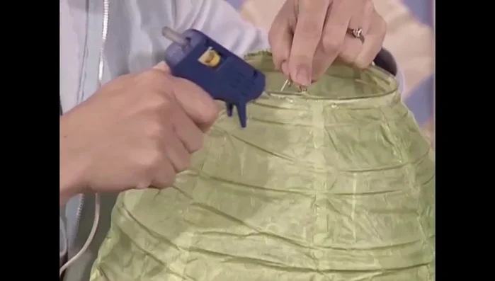 Attach bias tape to the top and bottom edges using a hot glue gun.