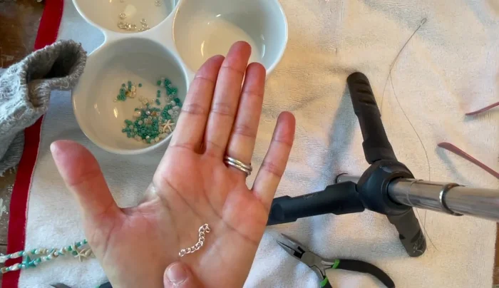 Optional: Add an extender. Attach a short chain to the clasp using a jump ring for added length.