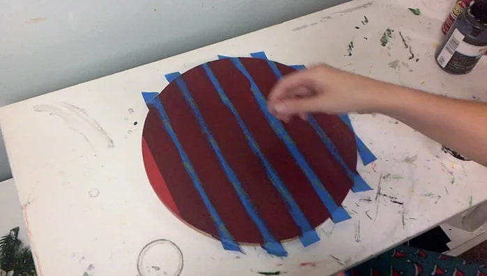 Remove the tape to reveal the checkered pattern.