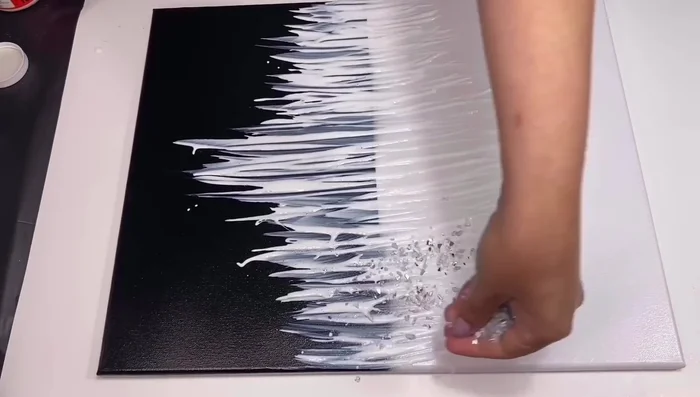 Shake off excess glitter and let it dry.