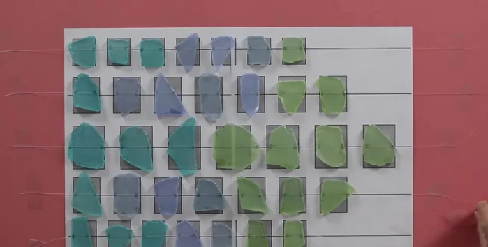 Peel the template away from the sea glass and fishing line.