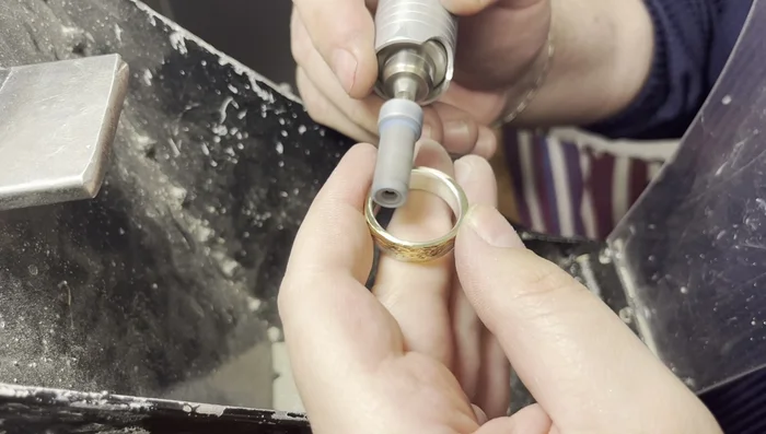 Final finishing: Hand-finish the ring, using a buff for the gold component.