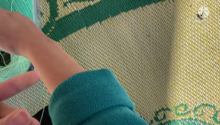 Attach leaves to the flower center using hot glue (optional).