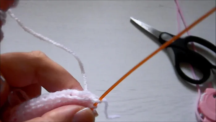 Pick up 10 stitches on the other side of the flap, the same way as step 6.