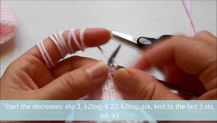 Begin decreases: slip one, knit two together, knit 22, knit two together, knit to the last three, knit two together, knit one. Repeat decrease pattern on every other row.