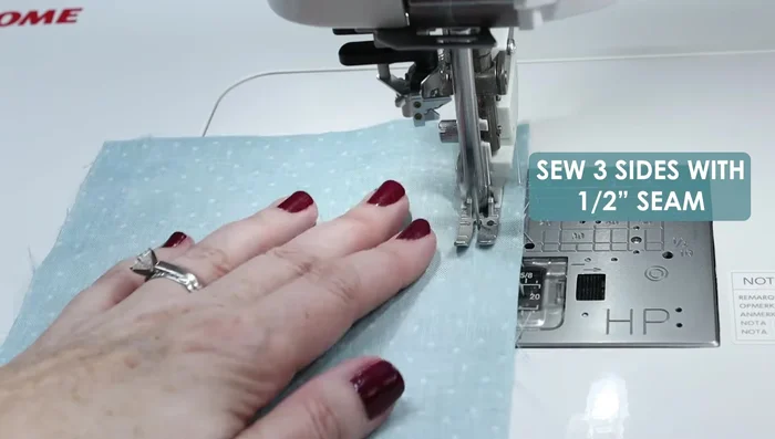 Sew the three sides with a ½ inch seam allowance.