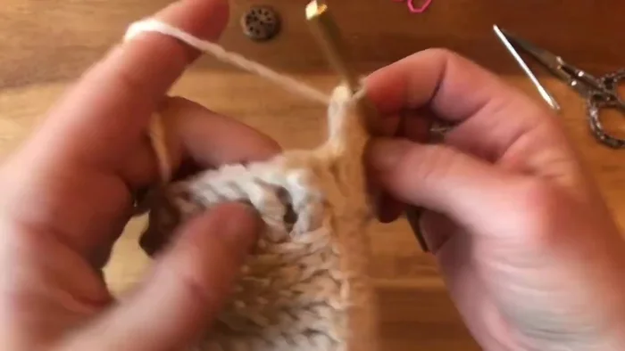 Round 26: Chain 2, work two front post double crochets together until only two stitches remain. Join with a slip stitch.