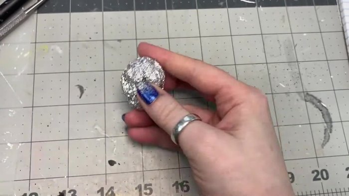 Use a round sculpting tool to indent eye sockets.
