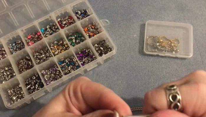 Gently bend the eye pin at a 90-degree angle using round nose pliers to create a loop. Make the loop as tight as possible to the bead to minimize spinning.