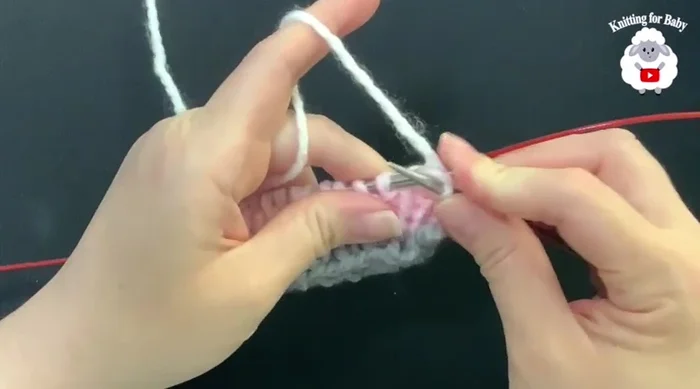 Knit every stitch for approximately 20 rows to create the hat body.