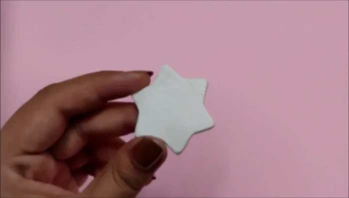 Decorate the shapes. (Example: paint a star purple, add glitter, then paint on a kawaii face.)