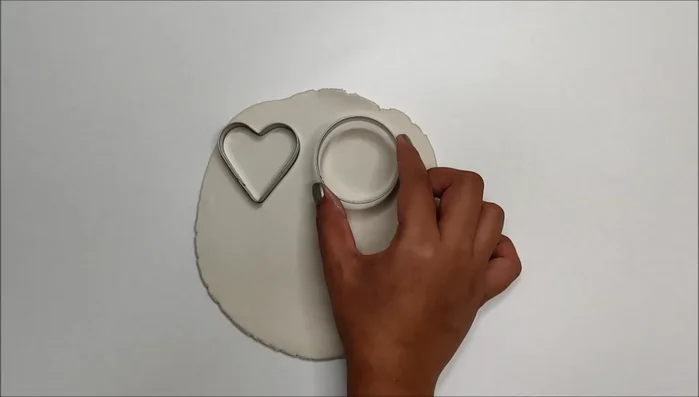 Make a hole in the middle of round shapes to create donuts.