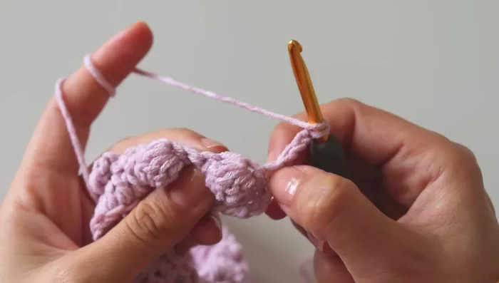 Finishing Row: Double crochet in each stitch across. Chain 1 and turn.