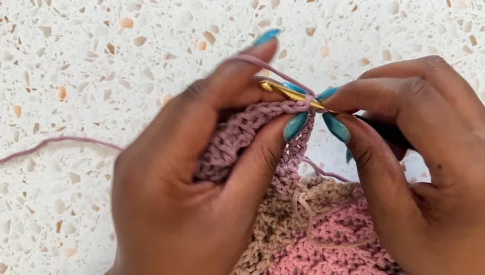 Border: Chain 1, turn. Single crochet in each of the next two stitches. Then, repeat: pico (chain 3, slip stitch into the first chain), single crochet in each of the next two stitches. Continue around the blanket, using 3 single crochets for each corner. Finish with a slip stitch into the first stitch and fasten off.