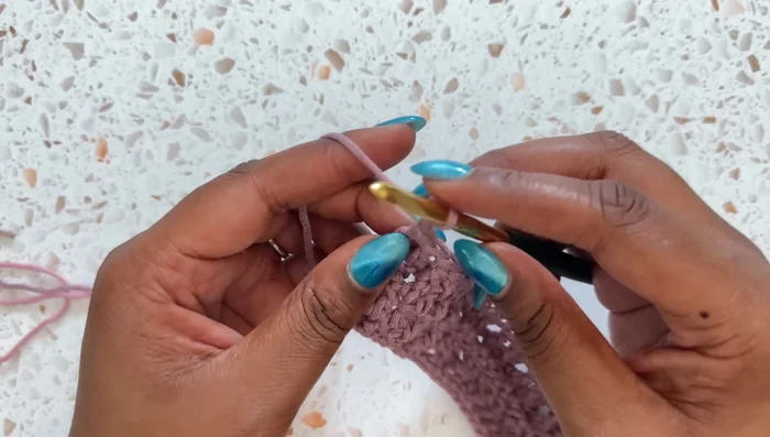 Color Changes: Create sections of 8 rows each in three colors (A, B, C), repeating the A-B-C sequence three times. Finish with one more section of color A.