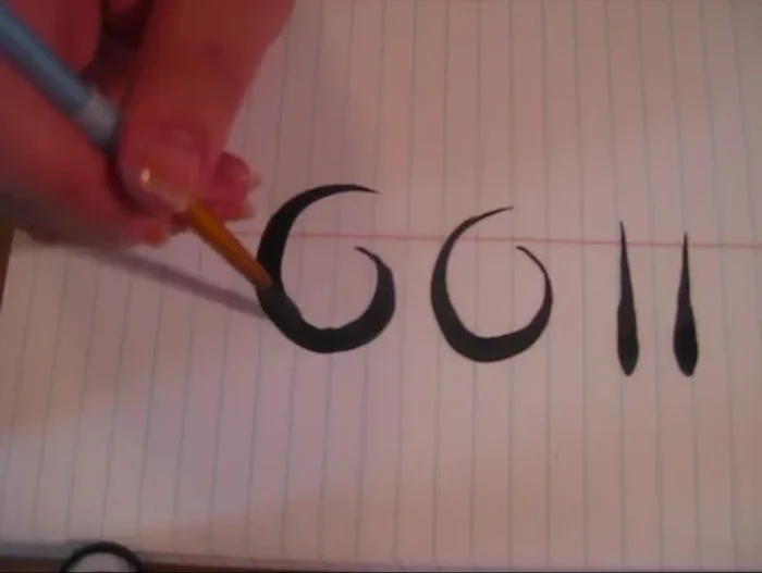 Add ‘legs’ to your design by following the curve of the existing shapes with your brush and connecting them smoothly to the thicker areas. Experiment with extending legs in different directions for varied effects.