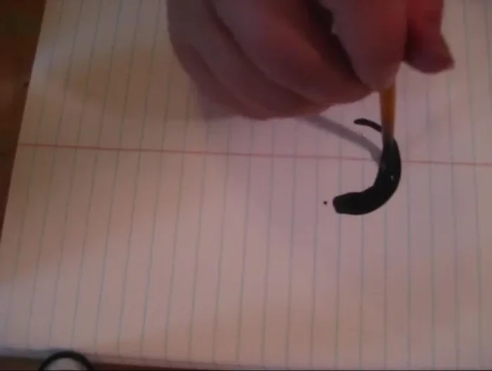 Add ‘legs’ to your design by following the curve of the existing shapes with your brush and connecting them smoothly to the thicker areas. Experiment with extending legs in different directions for varied effects.