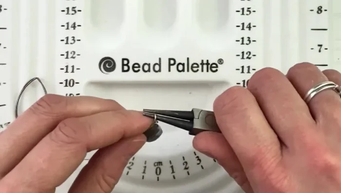 Attach the earring finding to the wire loop.