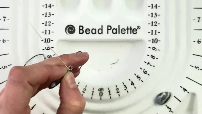 Attach the earring finding to the wire loop.