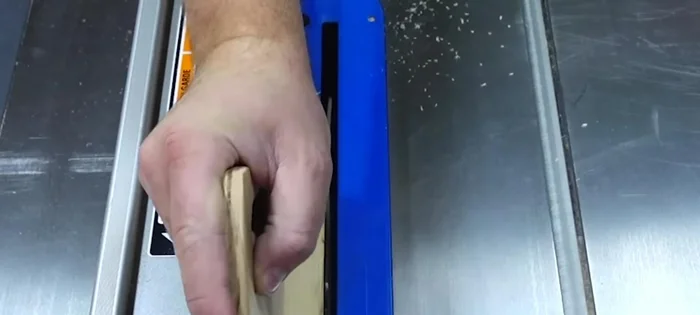 Prepare the wood: Clean up the edges of the walnut and hickory boards. Cut the hickory to about a quarter of an inch for the width. Cut two strips to ensure enough material.