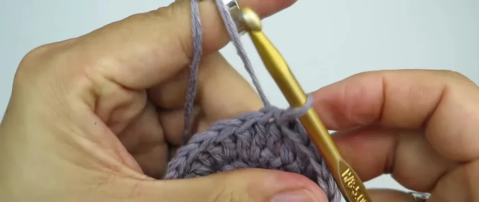 Round 3: Slip stitch into the first stitch, chain 2, then work (1 double crochet, increase) in each stitch around (total 36 stitches).